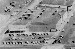 A 1955 aerial view of the building that would later be remodeled into Movies 10.